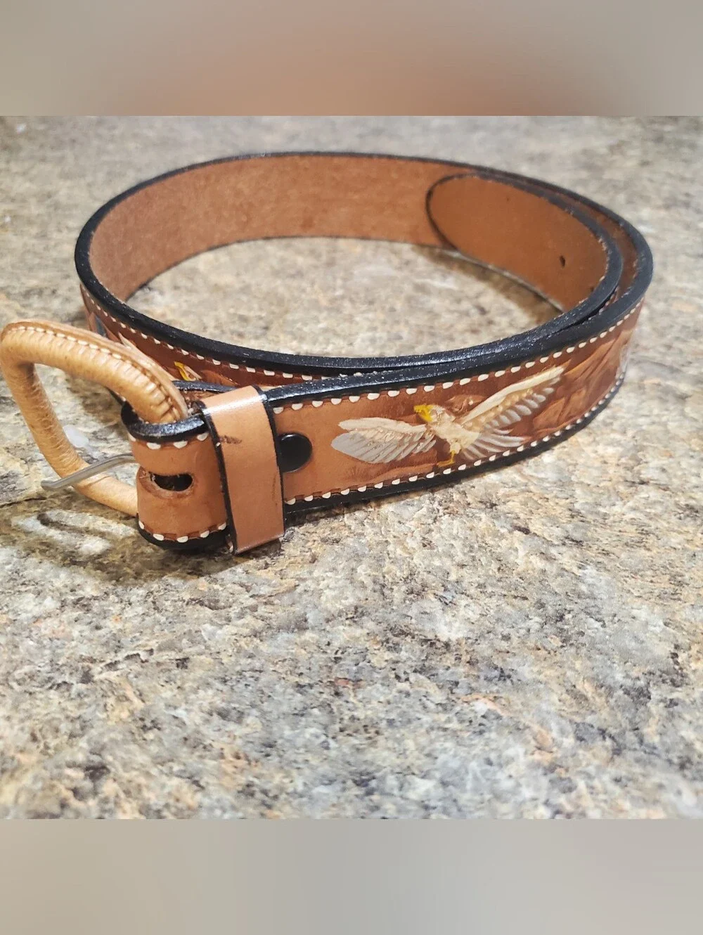 NWOT LEATHER SIZE 24. MEXICO BELT. TOOLED. ANIMAL